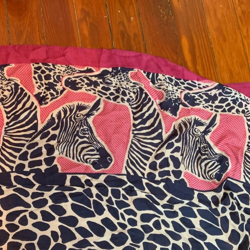 Large 100 percent silk zebras rap/scarf.‎ Used twice.